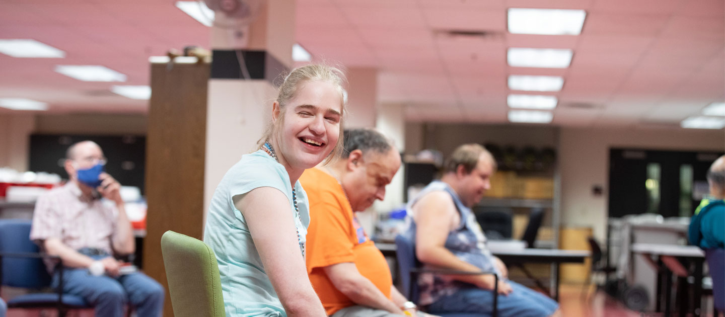 Girl who is visually impaired enjoys her time at PRIDE.