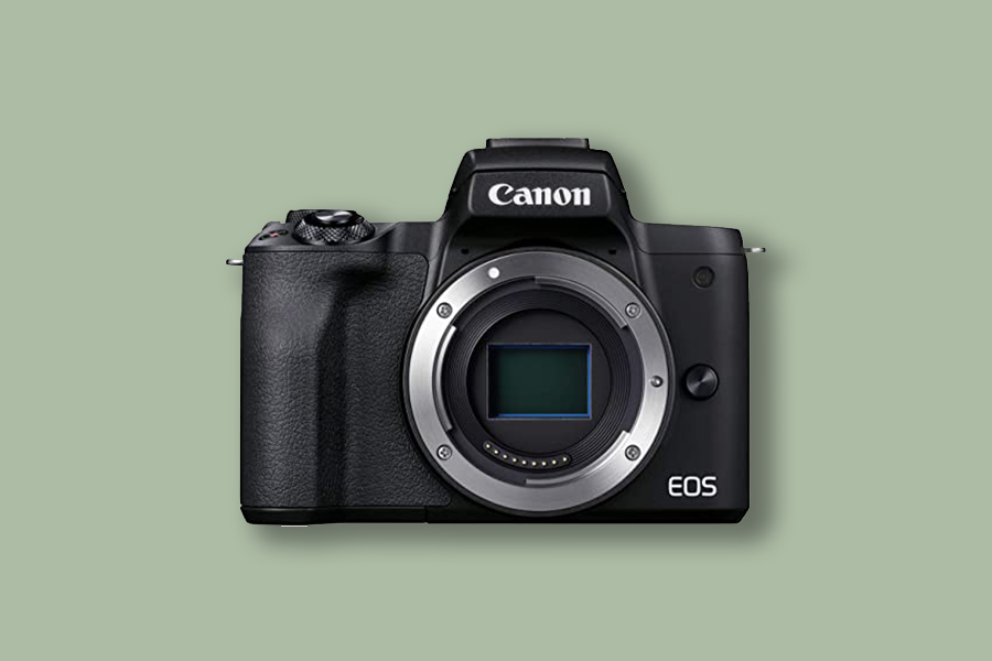 A Canon EOS M50 Mark II on a green back ground.