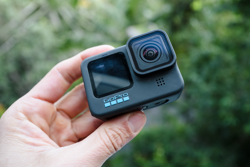 A person holding up a gopro hero 12 black.