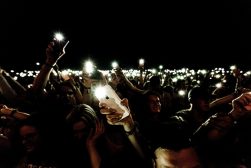 iphone flashlights shining in dark