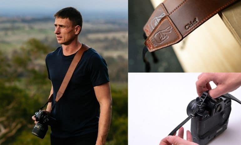 man looking into distance wearing leather strap attached to his camera