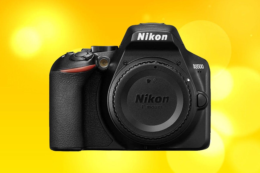 A Nikon D3500 ON A YELLOW BACK GROUND