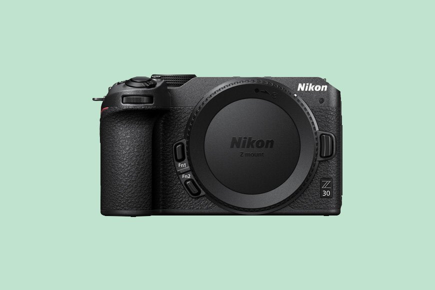 A Nikon Z30 on a green background.