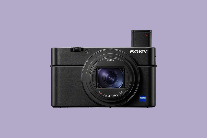 a Sony Cybershot RX100 VII camera on a purple background.