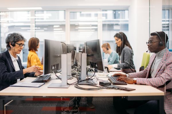 A call center station with 10 employees working on phones.