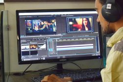 man editing video on a PC