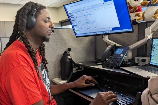 Jamal working at his desk.